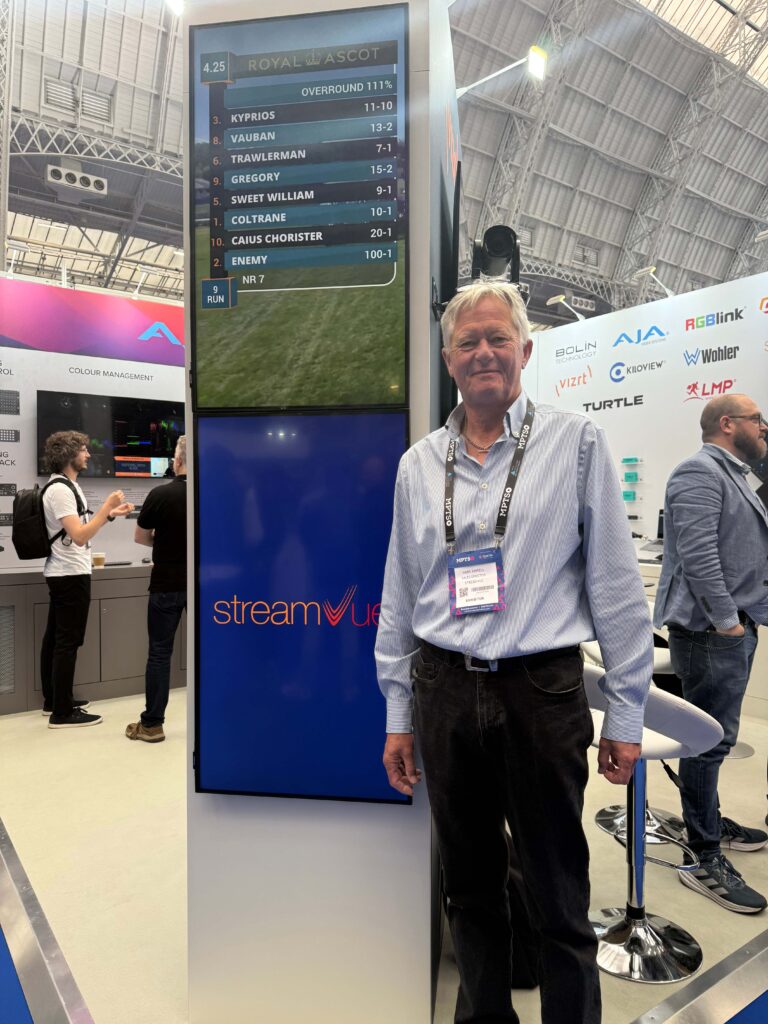 StreamVue digital signage displayed on 9:16 portrait screens at Digibox MPTS stand